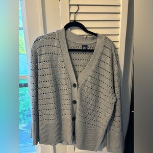 Loose knit cardigan sweater in heather gray.